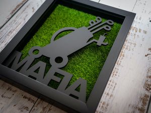 The perfect gift for any golfer who needs help with interior decorating. 3D Laser Cut Push Cart Mafia Wall Art with Turf Grass Background. Stretches 8'' x 10'' Framed In Satin Black Shadow Box. Laser Cut & Carefully Assembled in Our Los Angeles Workshop and Shipped Out Daily.