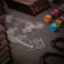 Load image into Gallery viewer, Topsy Timbers - The Incredibly Entertaining, Addictive, & Competitive Tower Building Game Designed & Manufactured from Aromatic Cedar in Our Los Angeles Workshop. Fun for the whole family with elements of chance and sabotauge! The boss went home early leaving you and the crew to manage the timberyard. Grab the keys to the crane, it's time to have some fun... Build a taller tower than your friends before the timberyard runs dry!